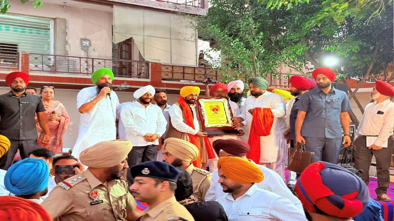 Chief Minister Bhagwant Mann interacting with residents during a public meeting in village Seneta, Mohali.
