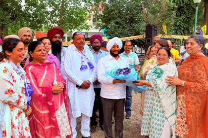 MLA Kulwant Singh interacting with residents during the Aap Di Sarkar Aap Da MC campaign in support of Rajinder Prasad Sharma in Ward 2, Mohali.
