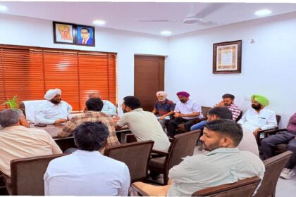 MLA Kulwant Singh interacting with residents during a public grievance meeting in Mohali focused on citizen services and local development issues