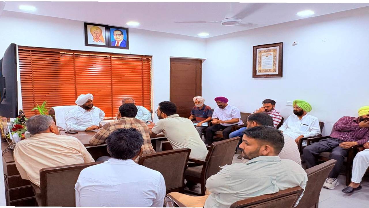MLA Kulwant Singh interacting with residents during a public grievance meeting in Mohali focused on citizen services and local development issues