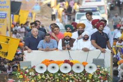 Chief Minister Bhagwant Mann, Arvind Kejriwal and MLA Kulwant Singh during the Thanksgiving Road Show in Mohali attended by a large gathering of residents