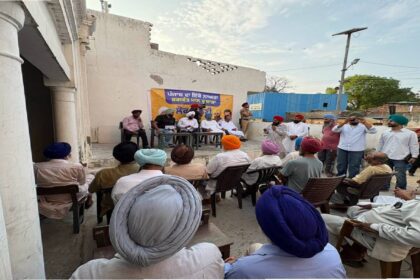 MLA Kulwant Singh interacting with residents during a community meeting in Manak Majra village, SAS Nagar Mohali, discussing development works and public welfare initiatives.
