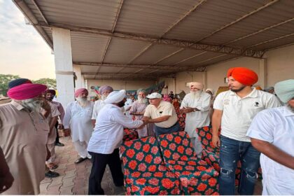MLA Kulwant Singh interacting with residents during a community meeting in Bahrampur village, SAS Nagar Mohali, discussing development works and public welfare initiatives.