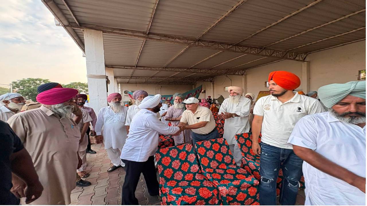MLA Kulwant Singh interacting with residents during a community meeting in Bahrampur village, SAS Nagar Mohali, discussing development works and public welfare initiatives.