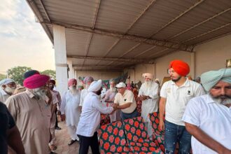MLA Kulwant Singh interacting with residents during a community meeting in Bahrampur village, SAS Nagar Mohali, discussing development works and public welfare initiatives