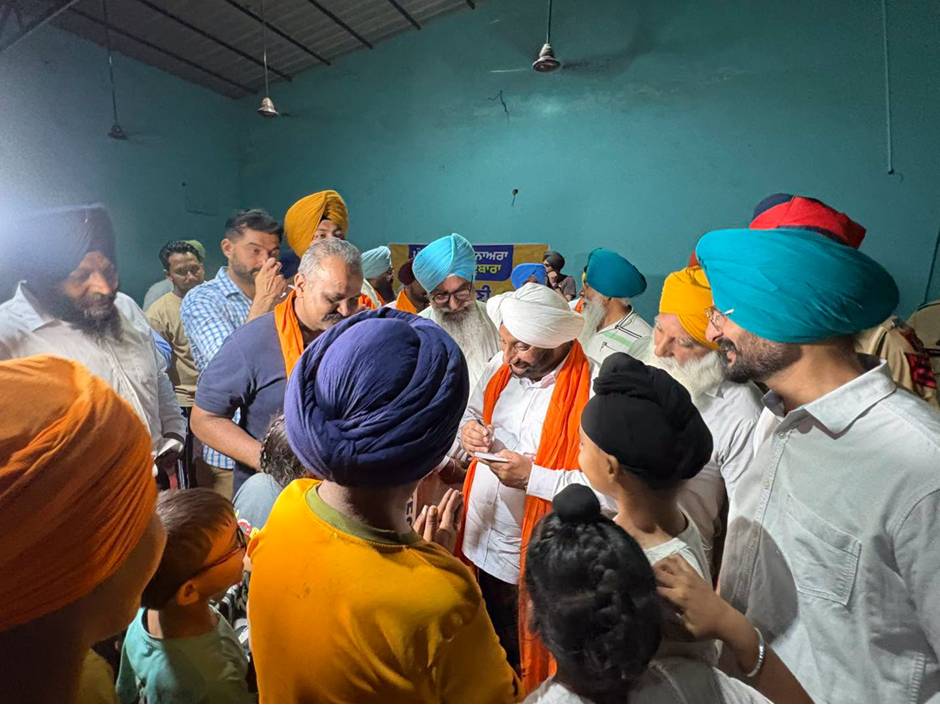 MLA Kulwant Singh interacting with residents of Bhagomajra village, SAS Nagar Mohali, during a community meeting on local development and public welfare.