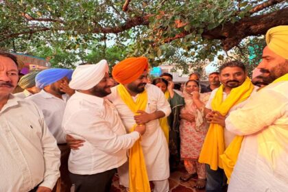 MLA Kulwant Singh interacting with residents during a community meeting in Daun Ramgarh village, SAS Nagar Mohali, discussing development projects and public welfare initiatives