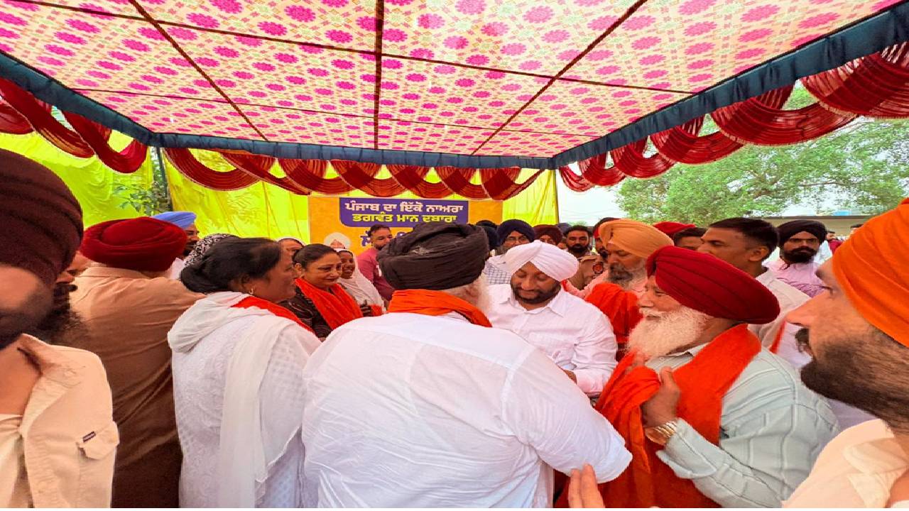 MLA Kulwant Singh interacting with residents during a Lok Milni programme in Barmajra village, SAS Nagar Mohali, and screening a documentary on Sri Guru Ravidas Ji.