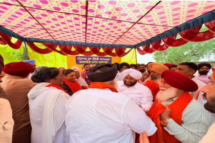 MLA Kulwant Singh interacting with residents during a Lok Milni programme in Barmajra village, SAS Nagar Mohali, and screening a documentary on Sri Guru Ravidas Ji.