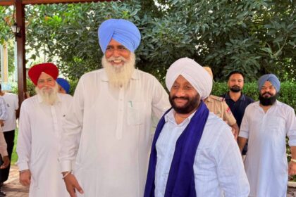 MLA Kulwant Singh addressing villagers during the Lok Milni programme at Chao Majra village in Mohali