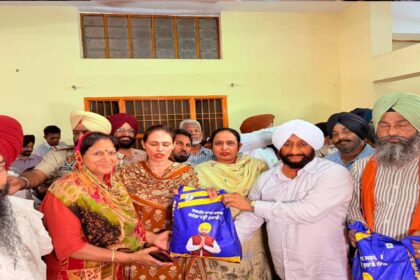 MLA Kulwant Singh distributes ration kits to needy families during the Lok Milni programme at Mataur village in Mohali