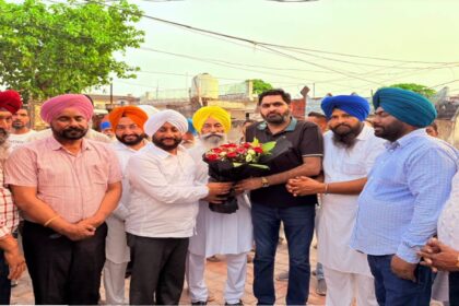 MLA Kulwant Singh interacting with residents during a Lok Milni programme in Raipur village, SAS Nagar Mohali, discussing development projects and public welfare initiatives