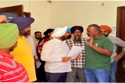 MLA Kulwant Singh interacting with residents during a public grievance meeting in SAS Nagar Mohali, listening to local issues and assuring timely action