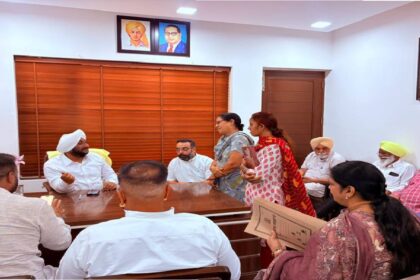 MLA Kulwant Singh interacting with residents at his constituency office in SAS Nagar Mohali, listening to public grievances and discussing local issues