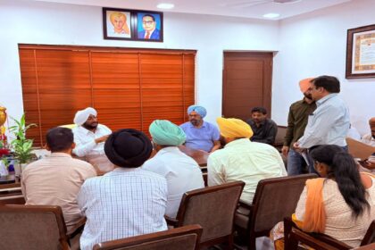 MLA Kulwant Singh interacting with residents at his constituency office in SAS Nagar Mohali, listening to public grievances and discussing local issues