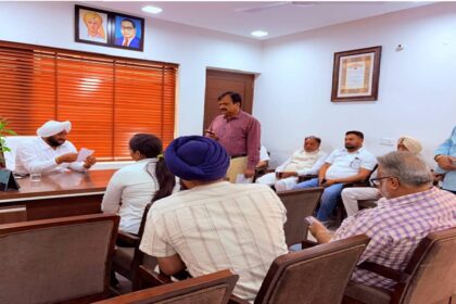 MLA Kulwant Singh interacting with residents during a public grievance meeting in SAS Nagar Mohali, listening to local concerns and assuring timely action