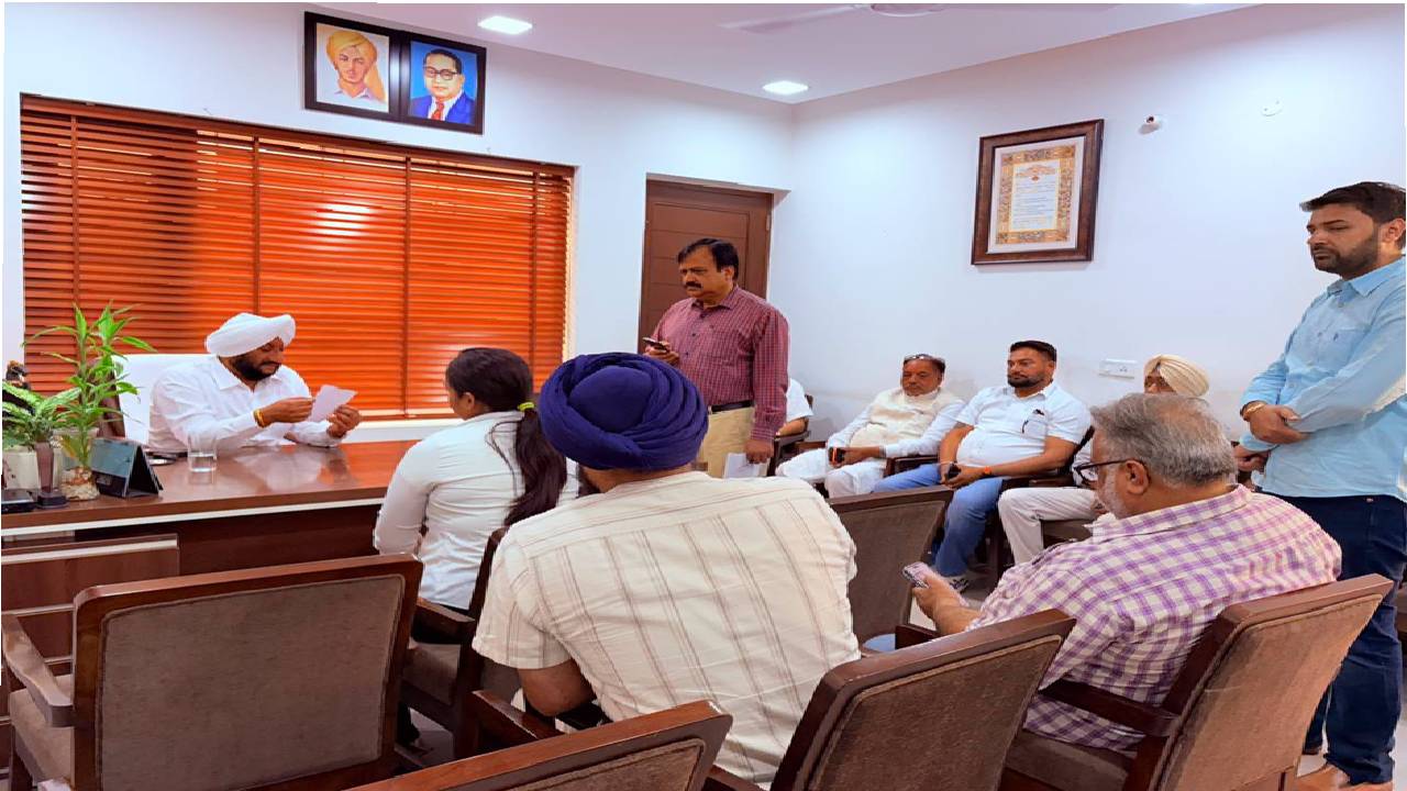 MLA Kulwant Singh interacting with residents during a public grievance meeting in SAS Nagar Mohali, listening to local concerns and assuring timely action
