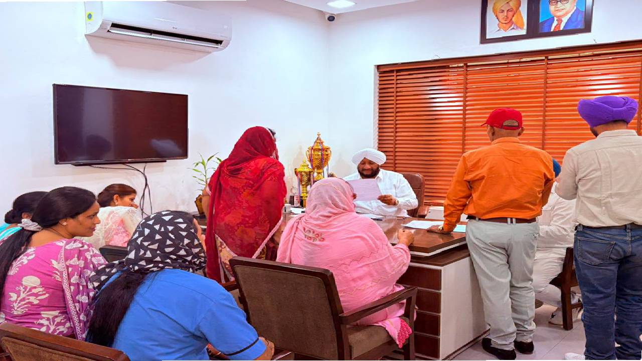 MLA Kulwant Singh interacting with residents during a public grievance meeting in SAS Nagar Mohali to hear local concerns and assure timely action