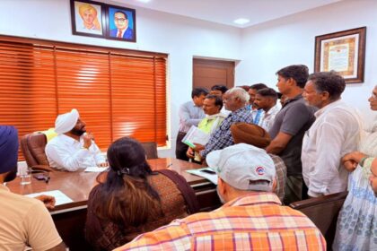 MLA Kulwant Singh meeting residents from different parts of Mohali during a public grievance session at his constituency office.