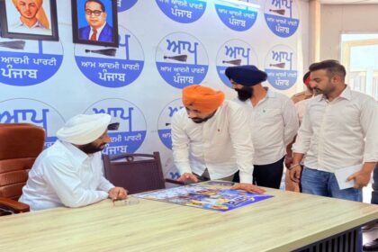 MLA Kulwant Singh interacting with residents during a public grievance meeting at his constituency office in Mohali