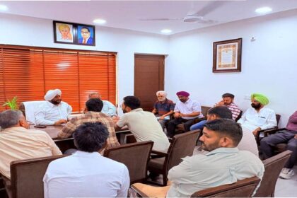 MLA Kulwant Singh interacting with residents during a public grievance meeting in Mohali focused on citizen services and local development issues.