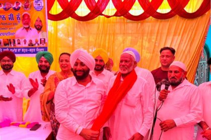 MLA Kulwant Singh congratulating Sodagar Khan during a thanksgiving ceremony following his appointment as Chairman of the Punjab State Muslim Development Board in Mohali.