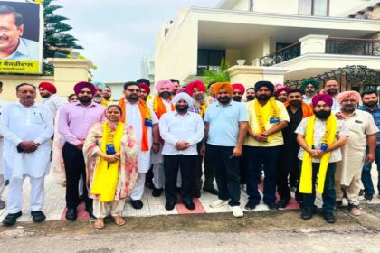 MLA Kulwant Singh welcomes Harjit Singh Bholu and supporters into the Aam Aadmi Party in Mohali.
