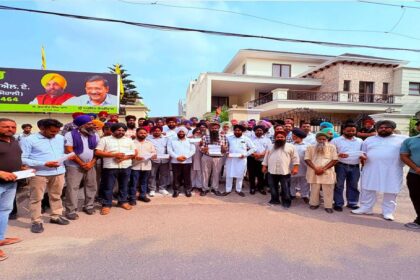 MLA Kulwant Singh distributes development grant and housing assistance cheques to beneficiaries in the Mohali constituency