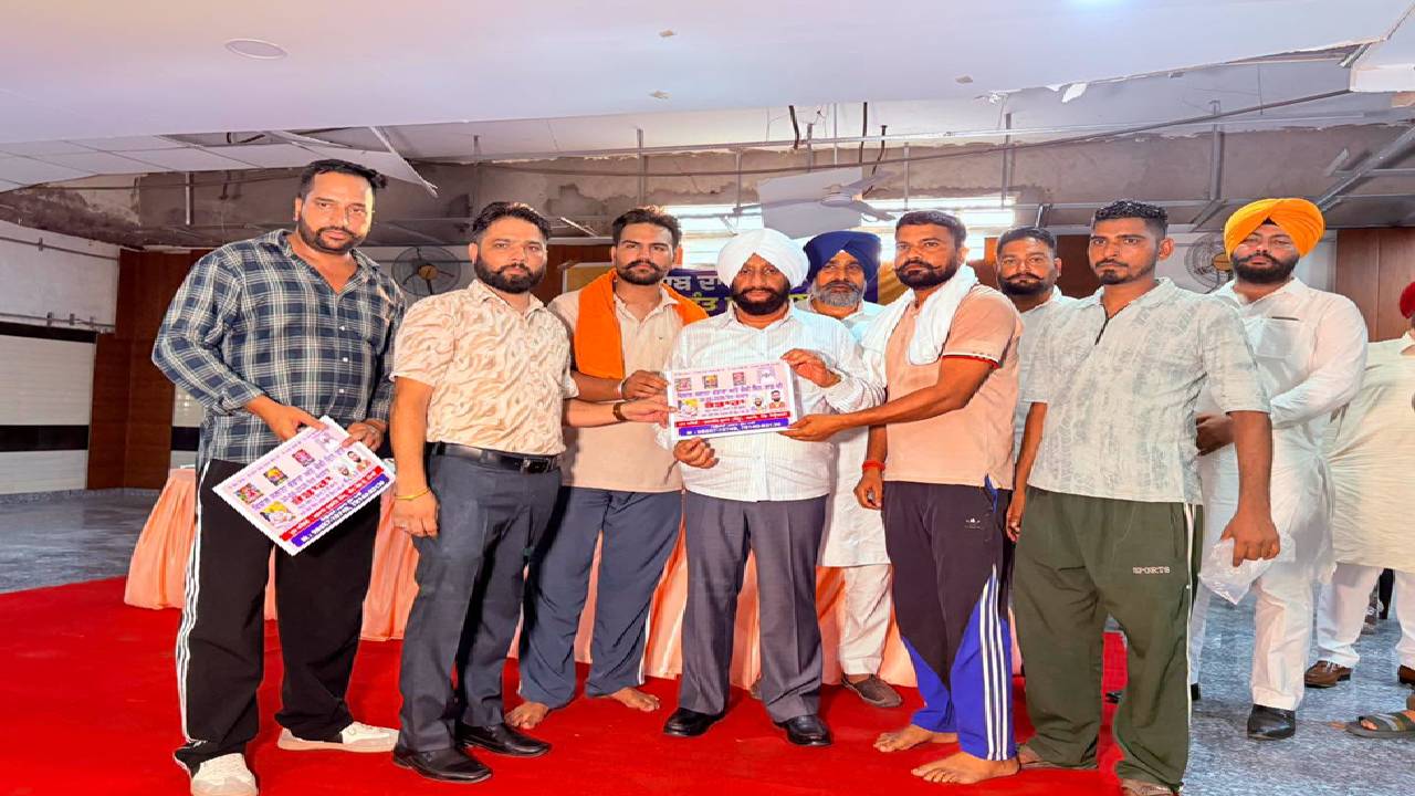 MLA Kulwant Singh interacts with villagers during a Lok Milani programme at Jhurhedi village in Mohali.