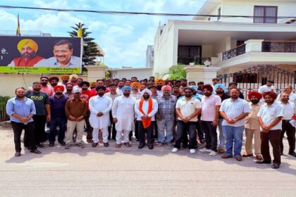 MLA Kulwant Singh interacting with residents during a public grievance meeting at his constituency office in Mohali.