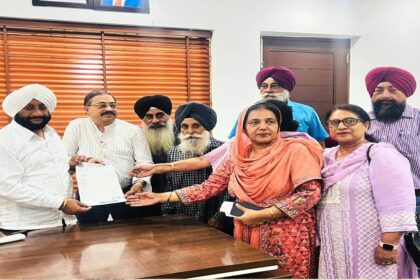 MLA Kulwant Singh interacting with residents during a public grievance meeting at his constituency office in Mohali