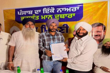 MLA Kulwant Singh interacts with villagers during a public meeting at Maujpur village in Mohali.