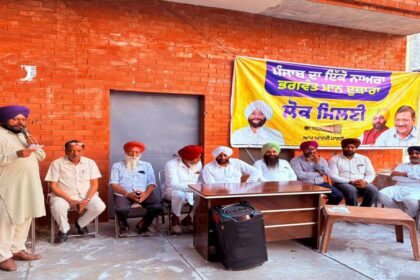 MLA Kulwant Singh interacts with villagers during a public meeting at Raipur Kalan in Mohali.